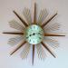 A starburst wall clock with another new brass dial, battery movement, Snider Clock Mfg Co.