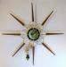 Starburst electric wall clock, Snider Clock Mfg Co.