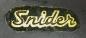 Close-up of script Snider decal used on late 1950s wall clock dials, Snider Clock Mfg Co.