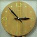 Solid wood dial on metal mesh wall clock, screen-printed numbers, Snider Clock Mfg Co.