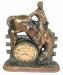 A large coppertone mantel clock with windup movement, Breslin Industries.