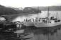 Boats tied to the wharf at Henry Vokey's shipyard in Trinity, Newfoundland.