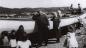 John P. and Hannah Farrell, surrounded by family, preparing to launch their trap skiff.