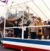 A group of officials at the Marystown Shipyard conducting a ship christening ceremony.