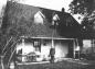 Reverend Everett Fleming standing in front of the Brent homestead