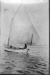 Ira Hersey in a fishing boat in Freeport Harbour c. 1912
