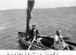 Russell Whitenect and Mrs. Wiley in a row boat