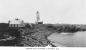 The lighthouse keepers home at Western Light , with their fish skids, and houses.