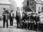 Fishermen posed by the salt fish c. 1910