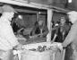 Connor Brothers Fish Plant workers, dressing fish to go to the cannery.