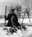 Sid Morehouse Sr. with dog Bing after a day's hunting.