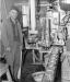 Willard (Whid) Thurber at the sealing machine at Connor Brothers Cannery 