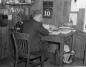 Manager, seated in the office at Connor Brothers