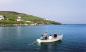 Sculling the boat in the harbour