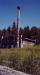 Jim Hart's chieftainship totem pole and his longhouse on the shore.