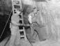 Two miners drilling in the Malagash Mine