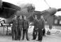 Airmen buddies with a Mosquito B. 25.