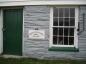 Basement door and corner stone