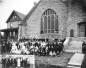 Congregation outside of the Presbyterian Church