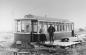 Man and Woman by their streetcar