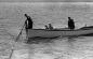 children going to the fishing nets with their fathers