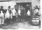 Fishermen showing their large cod fish.