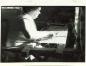 Annie Mae King hooking a mat