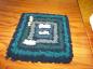 Small poked rug used as a pet mat