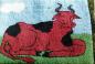 An early hooked mat wall hanging by Marge and Myrtle Keeping