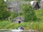 Cottage at Harbour Island as it appears today.  Fish cleaning hut in front.