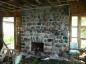 Fireplace inside the main lodge as it appears today at Harbour Island