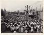 Crowds of people at the newly re-designed Canadian National Exhibition. Fronts designed by Jack Ray.