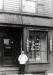 Mr. Nathan Lang outside his barber shop at 103 Clarence Street