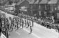 Parade along Rideau Street in front of Rideau Bakery