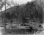 Crossing 20 Mile Creek into Camp Hedley ca. 1895