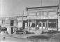 Duke Motor Service and George Sutton's store before the 1931 fire.
