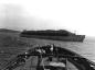 Barge load of pulp-wood leaving Hawke's Bay bound for Corner Brook, 1940's.