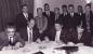 Signing of agreement by President of Local 64 and other members, 1969.