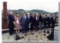 Group photo of Dignitaries standing on the roof of the Mill during the 10th Anniversary, 1995.