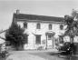 Craigflower Manor, with a car in the front yard