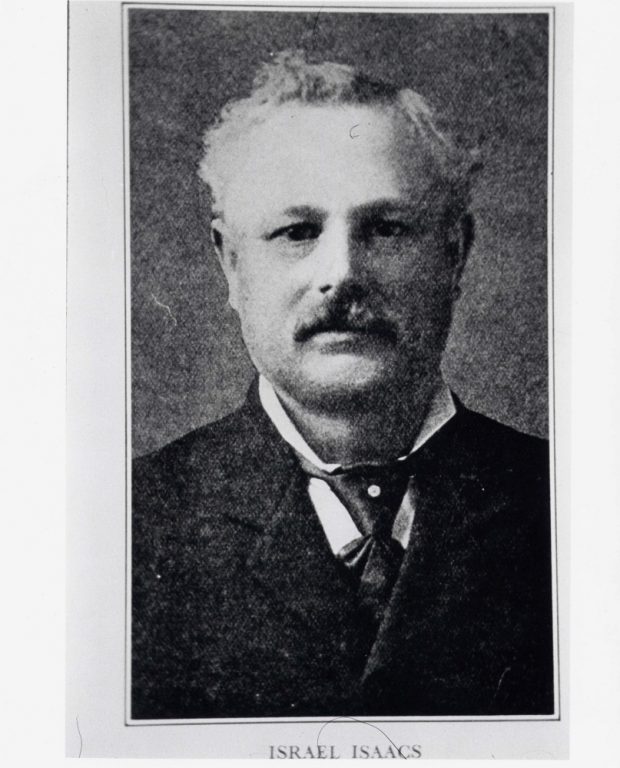 Formal black and white portrait of man with mustache