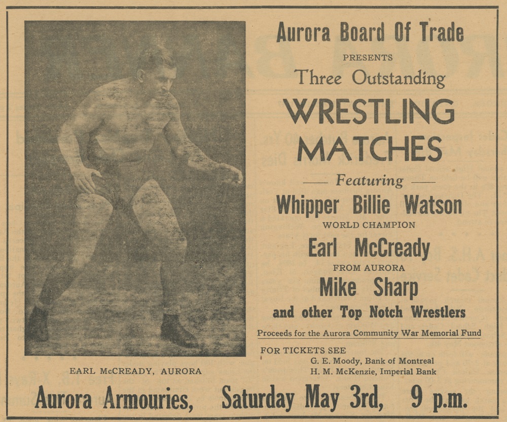 A black and white advertisement for wrestling matches containing written details about the event on the right and a photograph on the left of a man wearing tight fitting shorts, socks and boots standing in an aggressive lunge forward position