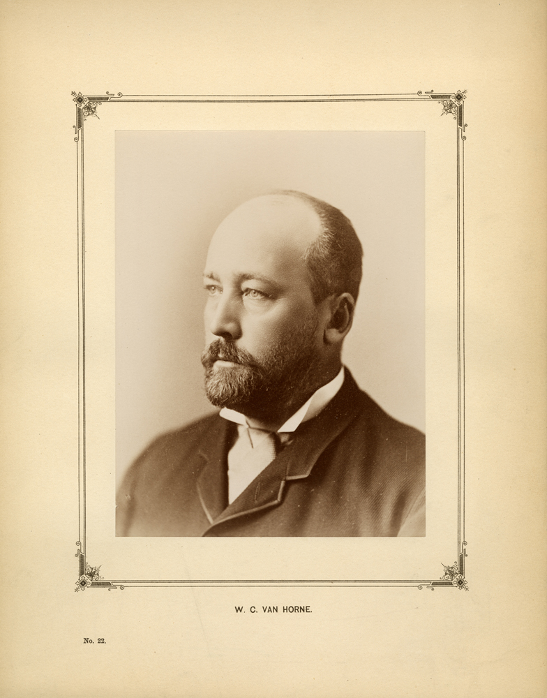Sepia photo of a formal portrait of the upper body of a man looking to the left.