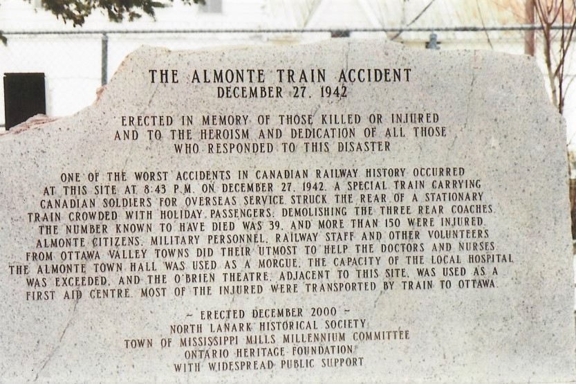 Photograph of the writing on one half of the stone memorial commemorating the Almonte Train Wreck, 2000