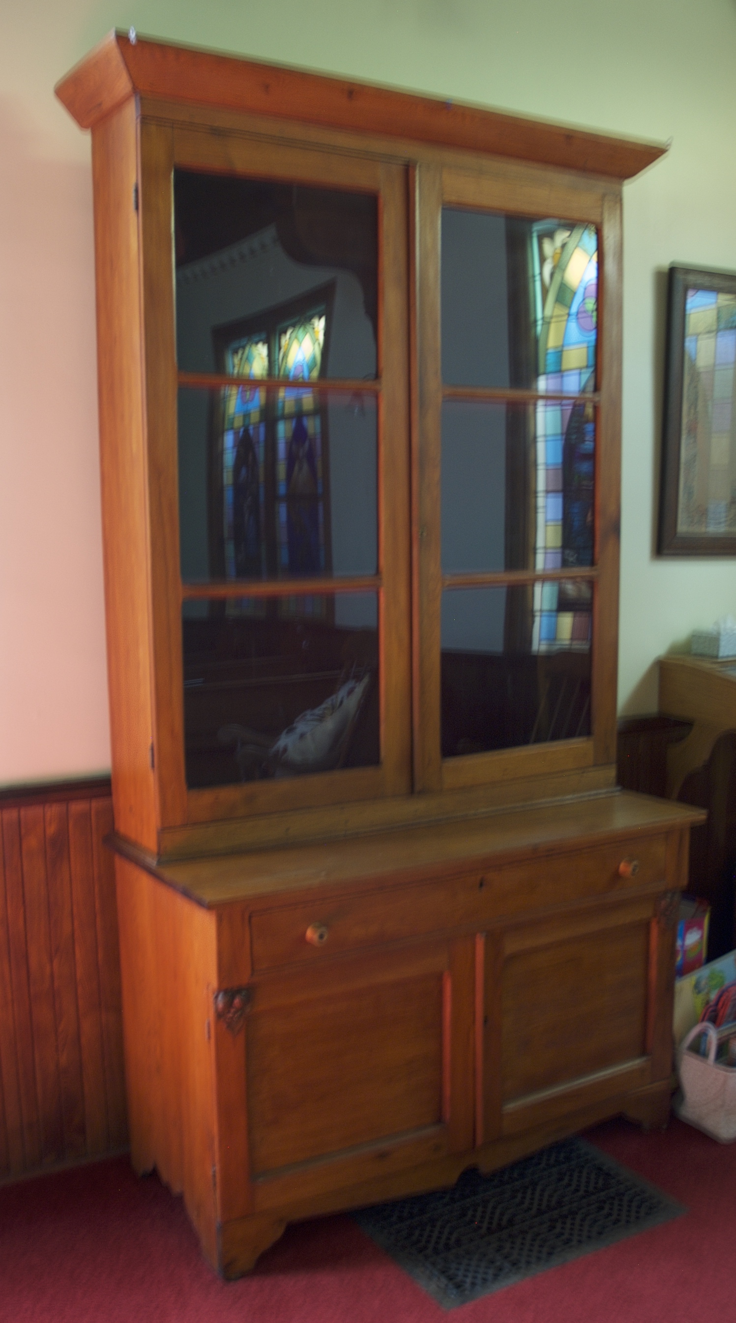 Photograph of a butternut oak buffet and hutch.