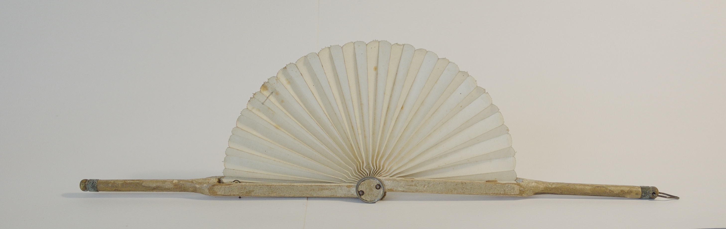 Woman's parchment fan with wooden handle