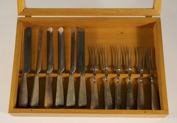 Oak box containing six knives and six forks that were used at Blythe Farm.