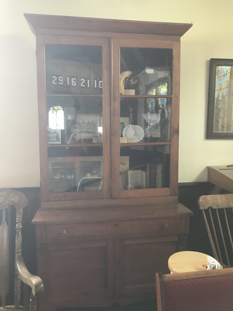 Photograph of a butternut oak buffet and hutch.