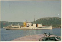 The Lady Anderson--the boat at anchor in a quiet bay.