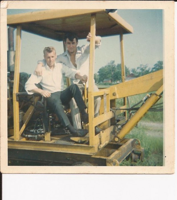 Lee's brother Lonz operates a machine while working on the railway